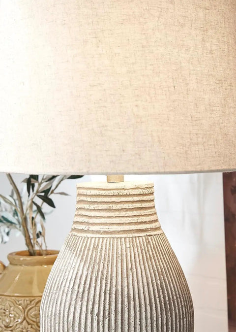 Dope Modern Table Lamp With Textured Paper Composite Base And Modified Drum Shade, beige decor close view.