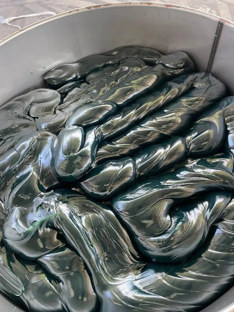 Close-up of green high-temp number two lithium complex grease multipurpose for wheel bearings and chassis with extreme pressure EP2
