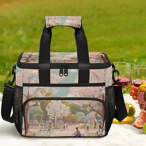 Insulated Picnic Backpack For Everyday Lunch On The Go with scenic print, 12x8.7x10in, on grass with food and drink setup.