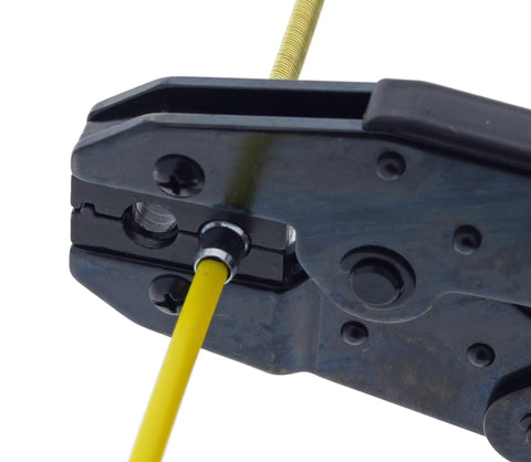 Crimping tool securing yellow S Class Fish Tape Field Replacement Leader With Fiberglass Construction for electricians