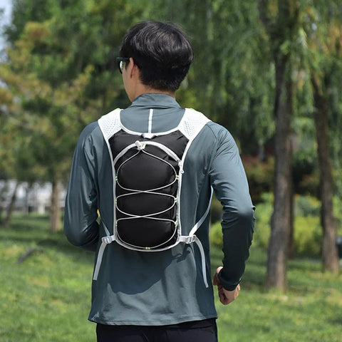 Back view of person wearing Lightweight Hydration Pack For Running And Cycling, Adjustable Reflective Vest For Men And Women