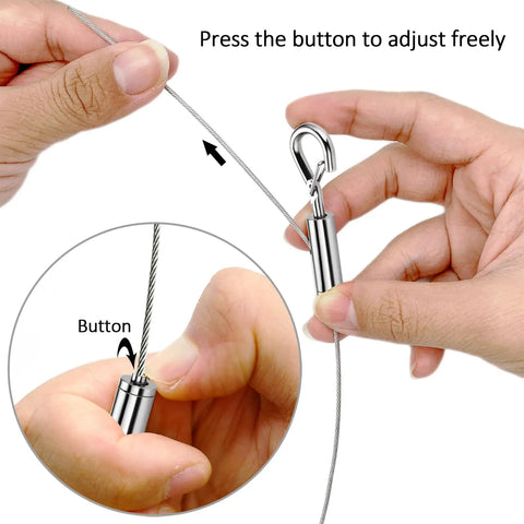 Close-up of hands adjusting Stainless Steel Picture Hanging Wire Kit, 25Kg Load, 2 Pack, Adjustable 2M Wire Rope With D Ring.