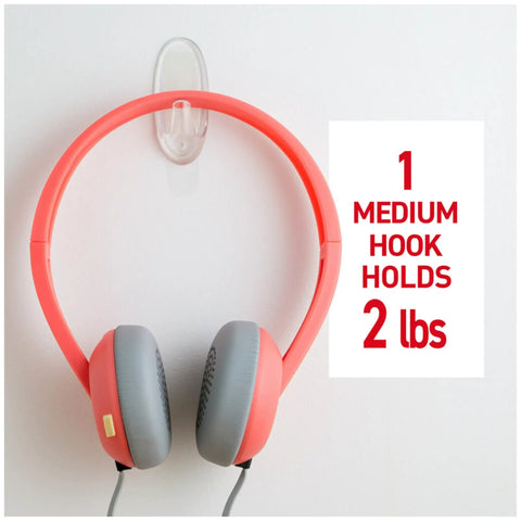 Medium Clear Damage Free Hanging Hooks Set With Six Hooks And Clear Strips holding headphones, showing capacity for dorms and apartments.