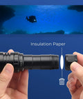 Hands assembling Powerful Dive Light 3000 Lumen 5000K Natural White Underwater Flashlight IPX8 Waterproof To 100M with insulation paper