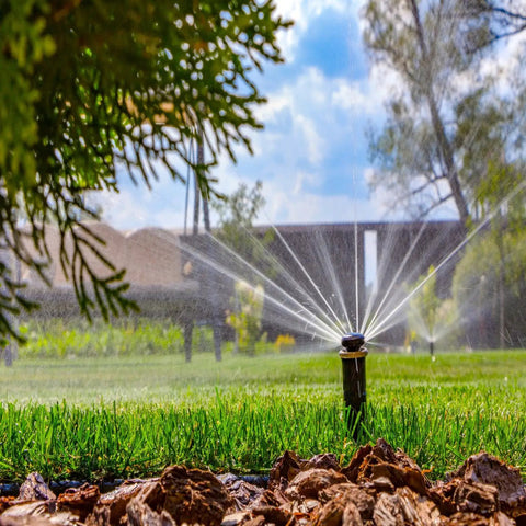 Lawn with active sprinkler system using 500 Ft 18 Gauge 7 Strand Black Solid Sprinkler System Wire For Outdoor Irrigation And Landscape Lighting