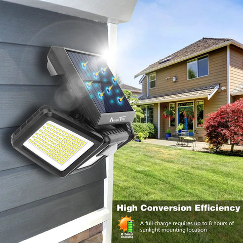 Solar Motion Sensor Flood Lights Outdoors Three Head Design With Wide Coverage And Motion Activated Technology installed on house wall