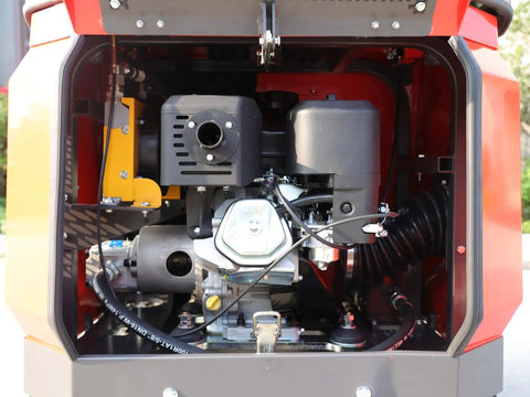 Compact 1.1 Ton Mini Excavator With Enclosed Cab And Hydraulic Thumb Attachment engine compartment view showing 13.5 horsepower motor.