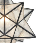 Close-up of the 14 Inch Star Pendant Light With Seeded Glass Shade, showcasing its handcrafted modern star design.