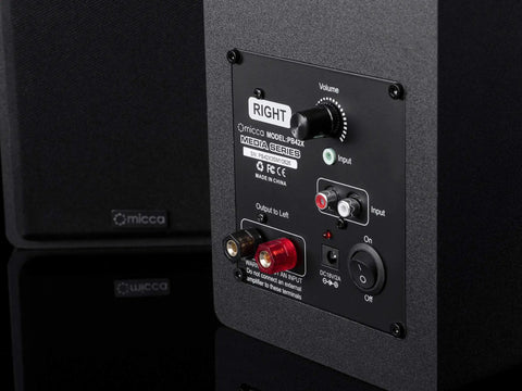 Back panel view of PB42X Powered Bookshelf Speakers With 30 Watt RMS, Near Field Studio Monitors showing volume and input controls.