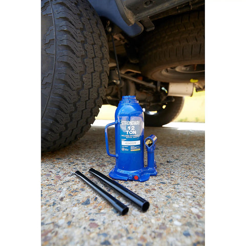 Badass 12 Ton Hydraulic Bottle Jack With High Grade Steel Welded Base for No Sweat Shop Grind Daily Auto Repair and Farm Hauling under vehicle.