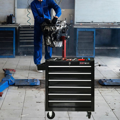 Heavy Duty Rolling Tool Chest With Six Roomy Drawers in a garage, supporting tools for mechanics, showcasing secure locking lid.