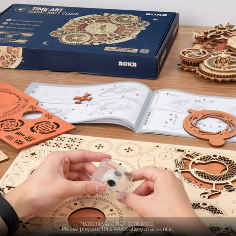 Hands assembling Dope 3D Wooden Puzzle Clock Kit For Adults Hands On Zodiac Wall Clock Project with parts and manual visible.