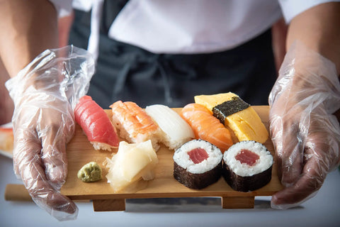 1000 Count Medium Disposable Polyethylene Food Handling Gloves Powder Free Latex Free No Sweat Grip With Heavy Duty Quick Change Pop Out Tray Sweet Bulk Deal For Kitchen Deli Garage used for sushi preparation.