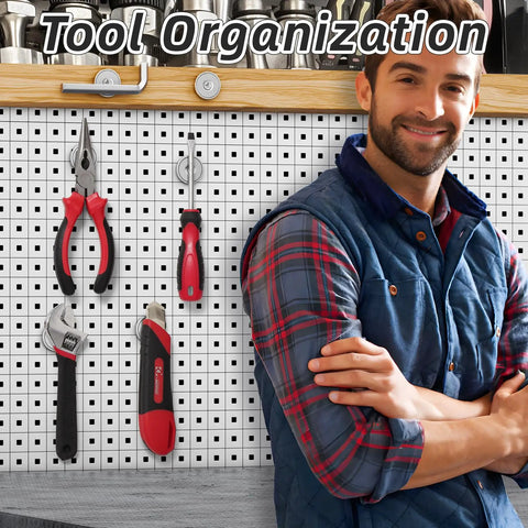 A workshop with tools mounted on a pegboard using Six Pack 70 Lbs Neodymium Round Base Cup Magnets With Countersunk Holes.