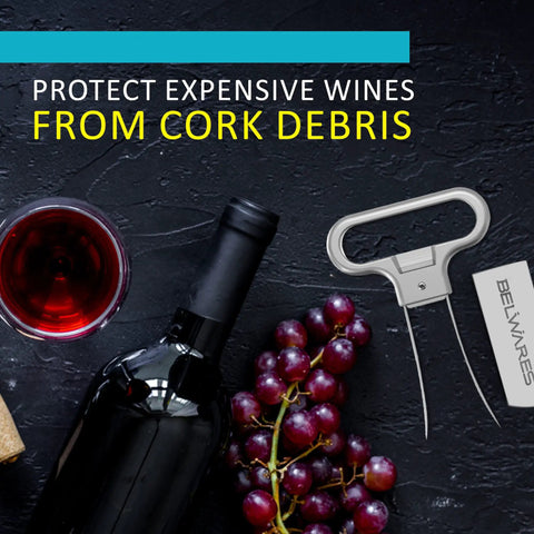 Killer Stainless Steel Two Prong Wine Opener Designed For Vintage Bottles And Fragile Corks beside wine bottle and grapes.