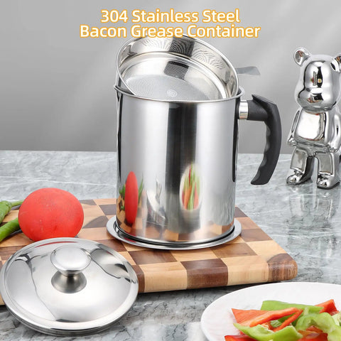 A Total Game Changer, This Heavy Duty Bacon Grease Keeper Boasts A Fine Mesh Strainer, 74 Oz Stainless Oil Jug For Kitchen Frying And Roasting, No Fuss Spill Proof Lid, Solid Grip Handle Included on marble countertop.