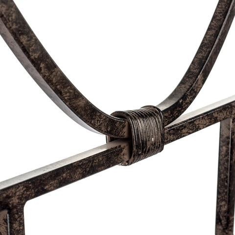 Close-up of Heavy Duty Iron Garden Trellis With Decorative Bells Freestanding Outdoor Climbing Support with iron detail.