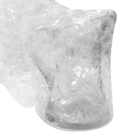 Kick Your Packing Game Up A Notch With This Heavy Duty Bubble Cushioning Wrap Perfect For Shipping Storage Or Moving Clear Perforated Rolls That Keep Fragile Gear Secure, covering fragile glassware in bubble wrap.