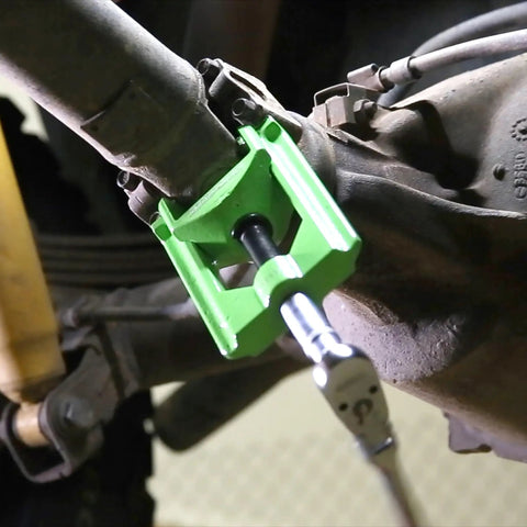 Light Duty U Joint Puller For Cars And Trucks Class 1-3 Removal Tool attached to a driveline during U joint removal