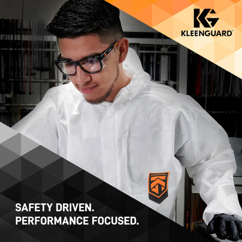 Worker wearing Maverick Eye Protection Glasses With Clear Anti Glare Lenses, Black Frame And Orange Tips, Modern Lightweight Safety Eyewear