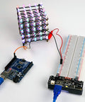 Dope Two Pack Breadboard Power Supply Module With USB C Charging 3.3V And 5V Rails Type A Output next to Arduino board and LED cube.