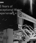 Moen 85 Years Exhibit Display with Moen Faucets For A Lifetime Banner at Trade Show