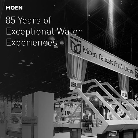 Moen exhibition booth showcasing 85 years of water experiences, featuring "Moen. Faucets For A Lifetime" banner.