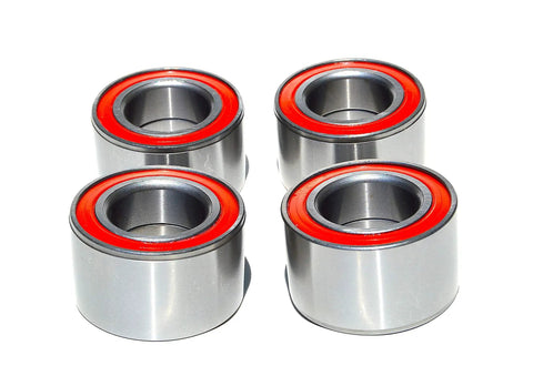 Hella Durable Front And Rear Wheel Bearing Set For ATVs And UTVs Designed To Kick Up Dust On Rough Trails Compatible With CanAm Defender Renegade And Maverick Side By Side Units, four silver bearings with red seals.