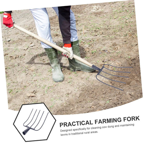 Person using Heavy Duty Five Point Manure Fork For Garden And Farm Cleanup Handheld Tool For Clearing Grass Debris And Manure In Rural Yards