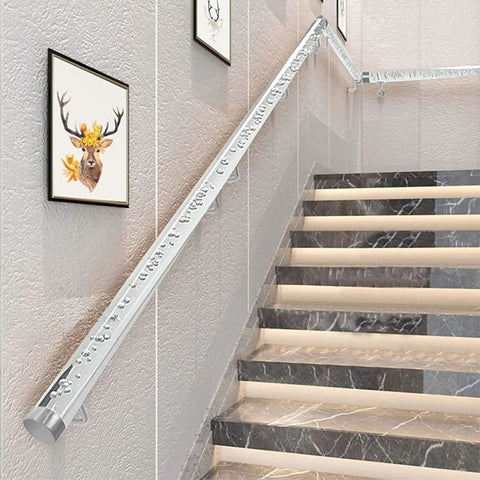 Dang Solid Clear Acrylic Handrail Kit For Indoor Stairs And Porch With Heavy Duty Stainless Brackets And Non Slip Grip mounted along staircase.