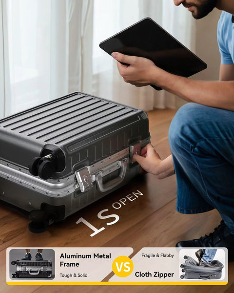 Person handling aluminum frame carry-on luggage with spinner wheels