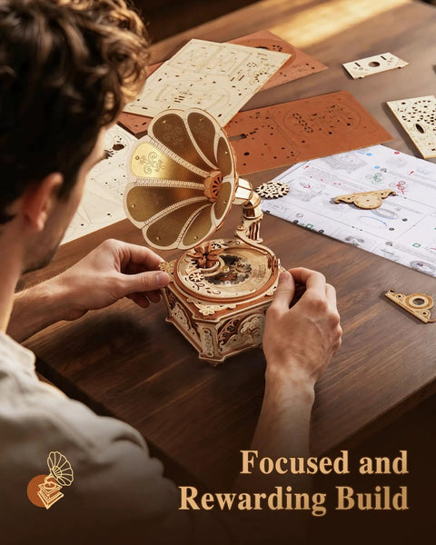 3D Wooden Phonograph Puzzle Kit for Adults, Diva Mechanical Music Box Model to Build, No Batteries Needed, Vintage Wooden Puzzle for Home Decor, DIY Craft Gift for Birthday and Collectors; man assembling