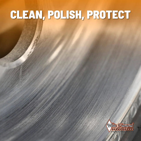 Close-up of metal surface with White Diamond logo, showcasing Metal Polish With Long Lasting Sealant Cleaner Polisher Protectant All In One