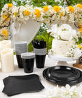 Fresh Black Disposable Plates 350 Piece Heavy Duty Food Grade Plastic Party Essentials For Weekend Ragers And Halloween Parties Straight Top Shelf Vibes set on decorated table with cake, cups, napkins, and candles.