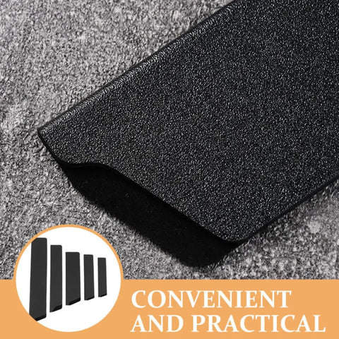 Close-up of a knife sheath from 5 Piece Cutter Protective Covers Set With Flocking Lining, textured black ABS material on gray surface.