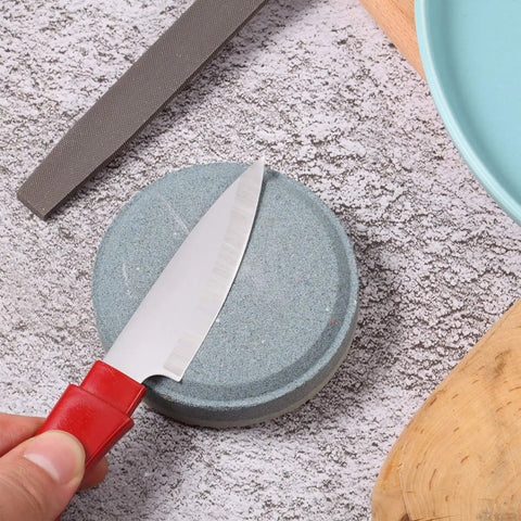 Axe File Sharpener Set Pro Grade With 120 And 240 Grit Whetstone and knife sharpening on a round stone with rectangular file nearby