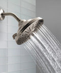 3 Spray Touch-Clean Shower Head In Venetian Bronze Finish, High-Pressure Full-Body Sprays, Easy-Clean Nozzles on tiled wall