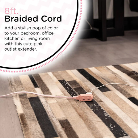 Braided Fabric 3 Outlet Extension Cord With 8 Foot Cable Flat Low Profile 2 Prong Plug Tangle Free Slide To Lock Safety Polarized ETL Listed Light Pink Decor Power Strip For Home Office, shown on carpet next to furniture.