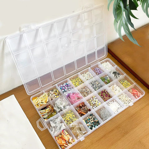 Keep Your Setup Hella Organized With This Solid Clear Plastic Storage Box Featuring 28 Compartments For Jewelry Beads Fishing Tackle Tool Parts And Craft Supplies Without Having To Mess Around Anymore, showing beads in clear organizer.