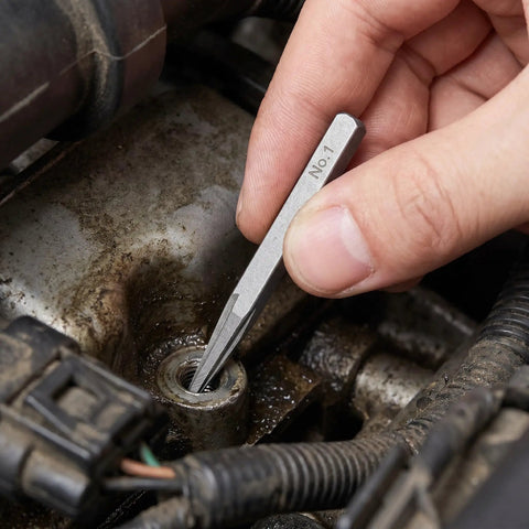 Get This High Carbon Steel Bolt Extractor Kit With Five Pieces To Save Your Threads And Fix Damaged Screws Fast Using A Tapered Guide For Enhanced Grip And Zero Deformation In Any Home Repair Job Or Garage. No. 1 extractor removing a damaged screw from an engine part