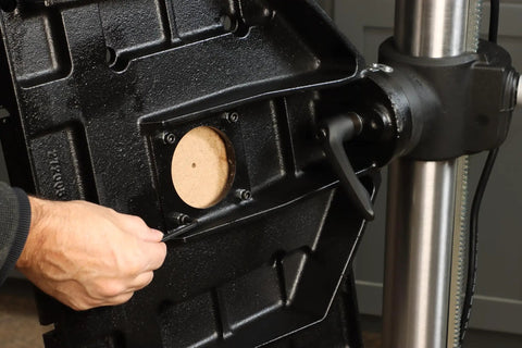 User adjusting the control panel on the Top Notch Benchtop Drill Press 1.5 HP 110V with touch screen and precision depth control.