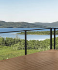 No Headache DIY Cable Railing Kit 30 Ft Black Face Mount Deck Railing System with Marine Grade Stainless Steel Wire on a scenic deck.