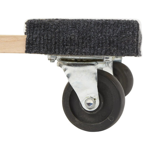 Heavy Duty Moving Dolly Featuring Tough As Nails Hardwood Platform And Smooth Riding Nonmarking Rubber Casters close-up of rubber caster wheel.