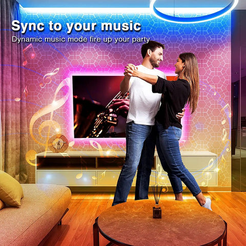 Couple dancing with 65 Ft RGB Smart LED Strip Lights With WiFi App Control And Voice Control Works With Alexa And Google Assistant.