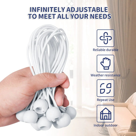 Hand holding Tough As Nails 6 Inch Ball Bungee Cords Set With UV Resistant Elastic Ties and Ball Ends, white cords indoors.