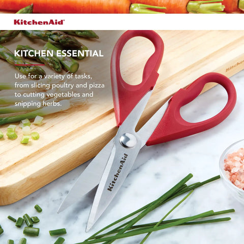 Top Shelf All Purpose Kitchen Shears With Protective Sheath Ridiculously Sharp Stainless Steel Blades Dishwasher Safe Cozy Comfort Grip Perfect For Snappy Meat Veggie And Packaging Cuts on a cutting board with herbs and vegetables.