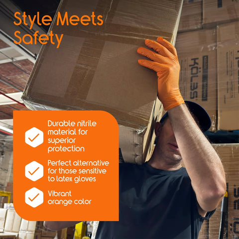 Orange nitrile disposable gloves worn by a worker lifting a cardboard box in a warehouse