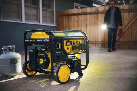 Beast 11500 Watt Dual Fuel Portable Generator with Electric Start beside propane tank outdoors at home