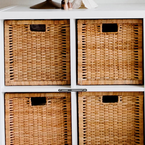 Four Piece Stainless Steel Straight Plates Flat Joining Brackets Used on White Cabinet with Wicker Baskets for Reinforcement