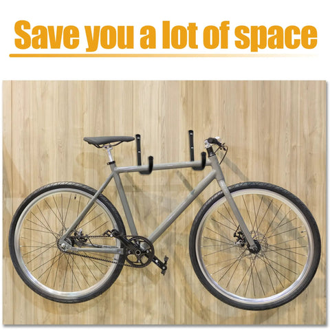 Beast Mode Heavy Duty Wall Hooks 4 Pack Black 8 Inch Long Hangers Thick Carbon Steel holding a bike on a wooden wall.